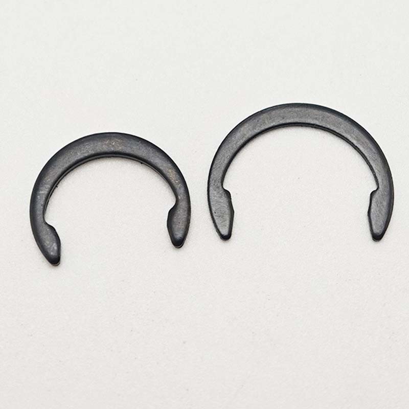 Rustfritt stålfjær holder ring